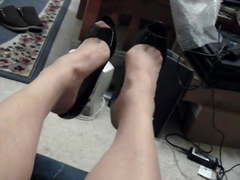 Beige RHT stockings, black patent shoes, white garter